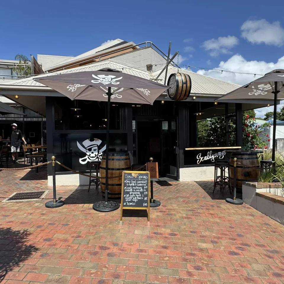 Front entrance of Scallywags restaurant with coastal views